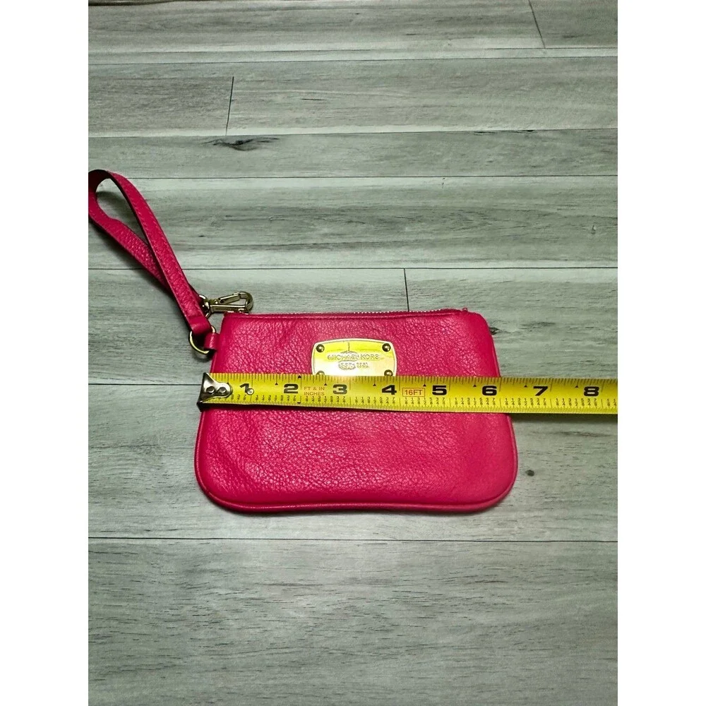 Michael Kors Fuchsia Leather Wristlet with Gold Plaque